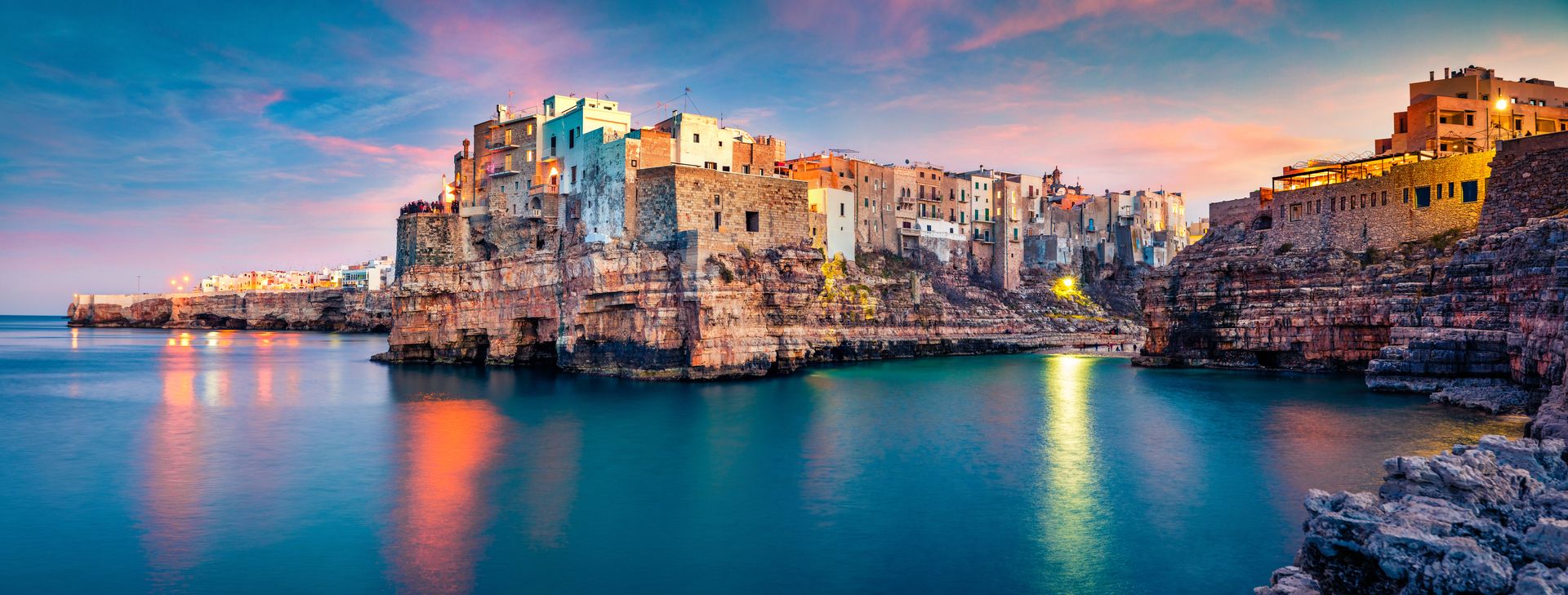 polignano a mare: a scenic, raw and unspoilt coastline with gorgeous vistas over the emerald sea 